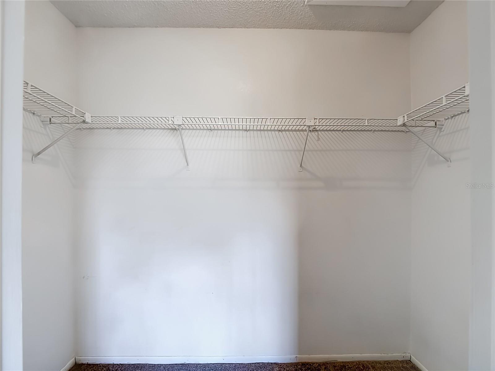 Primary Bedroom has a good sized walk in closet