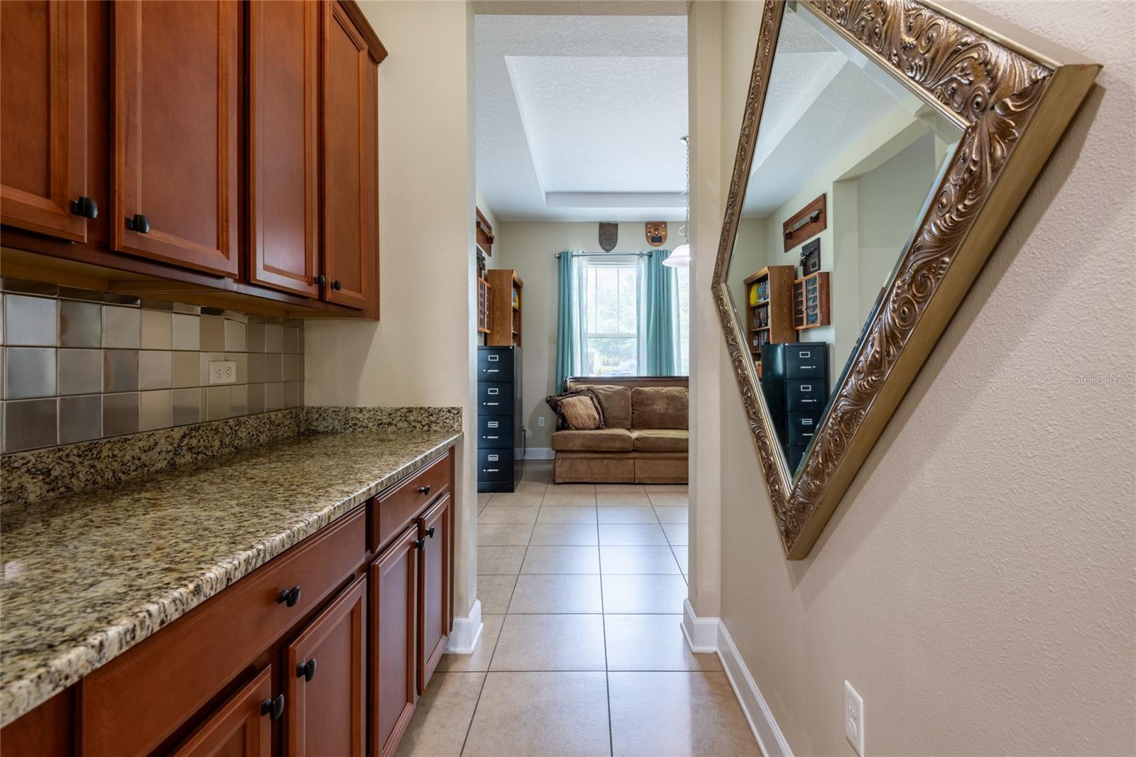 Butler's Area/Dry which leads into the family room or dining area.