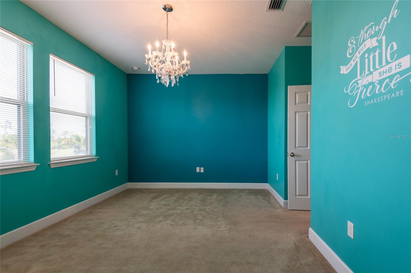 Bedroom 3 with a walk-in closet.