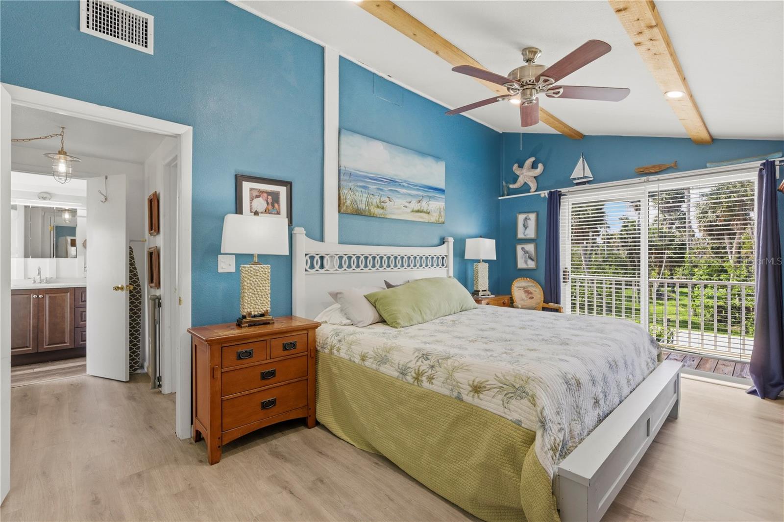 Large Primary Bedroom with balcony.