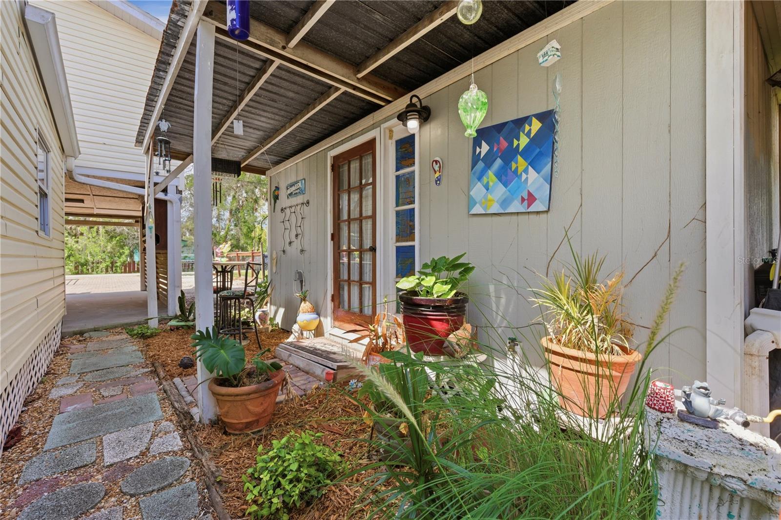Private entrance to Guest or In-Law Suite - third bedroom with bathroom.