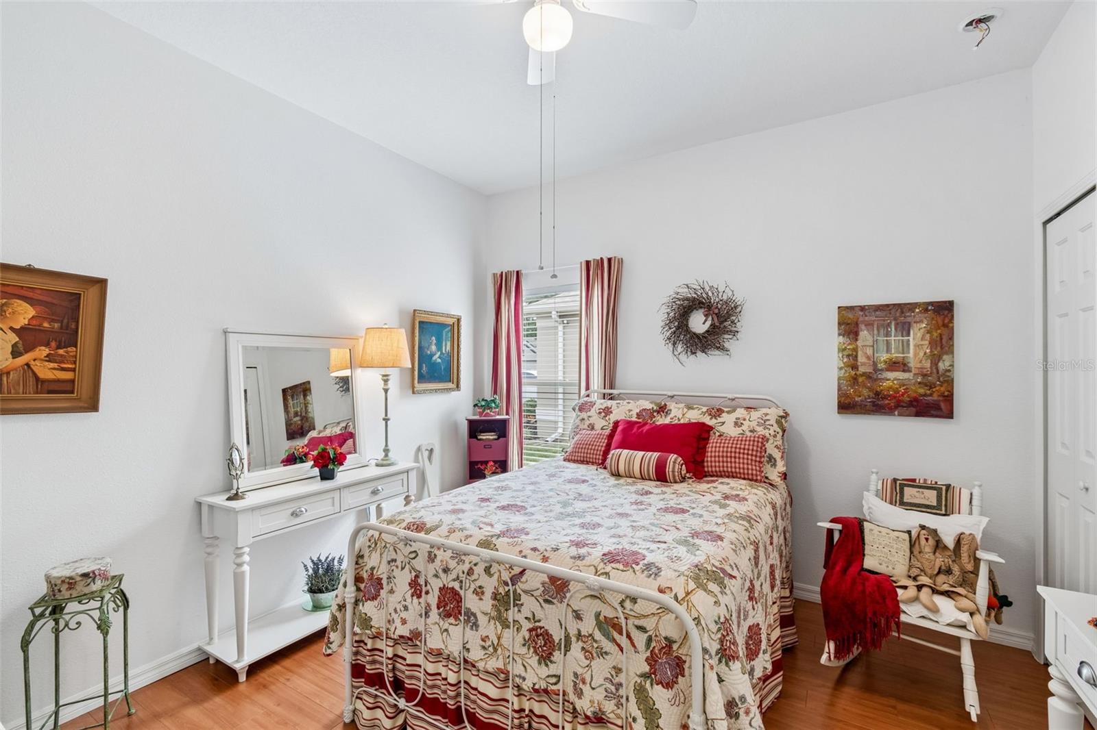 Second bedroom with wood floors