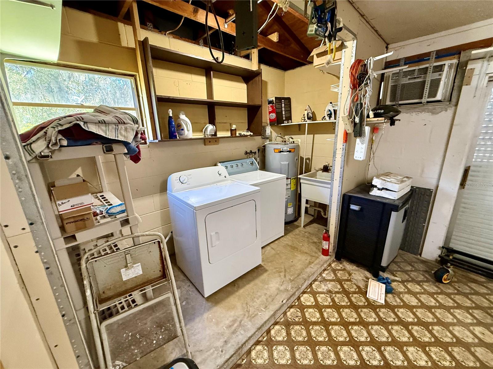 Full size laundry area.