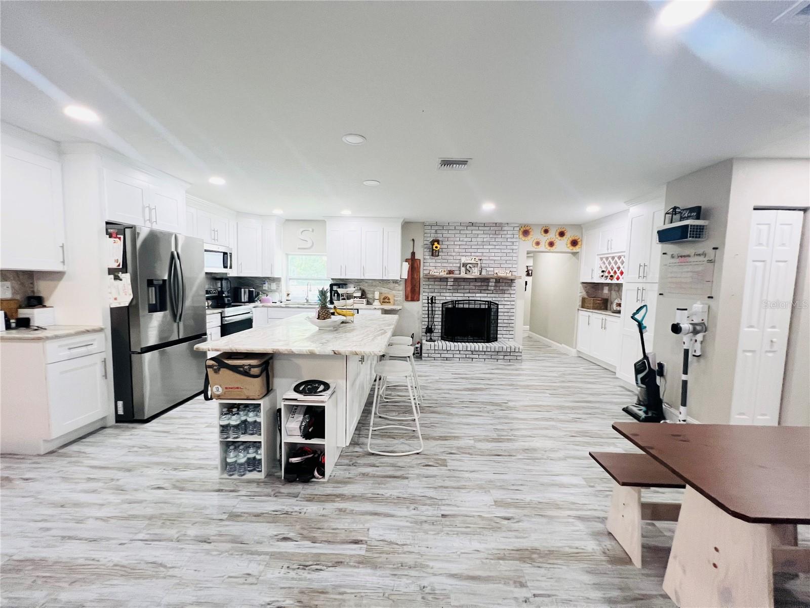 VIEW OF KITCHEN FROM ENTRANCE