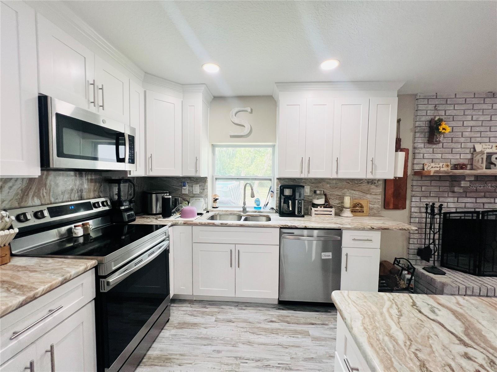 KITCHEN VIEW FROM LIVING AREA