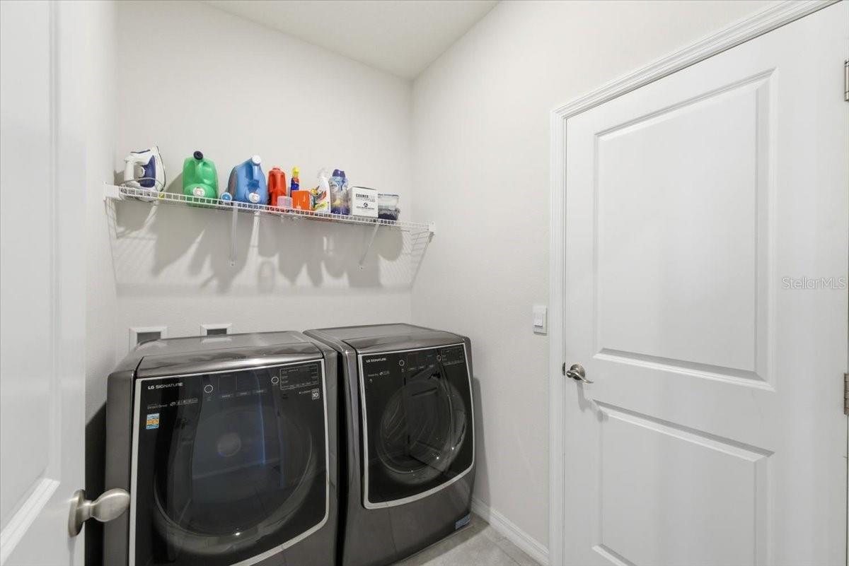 Laundry room leading to the garage.