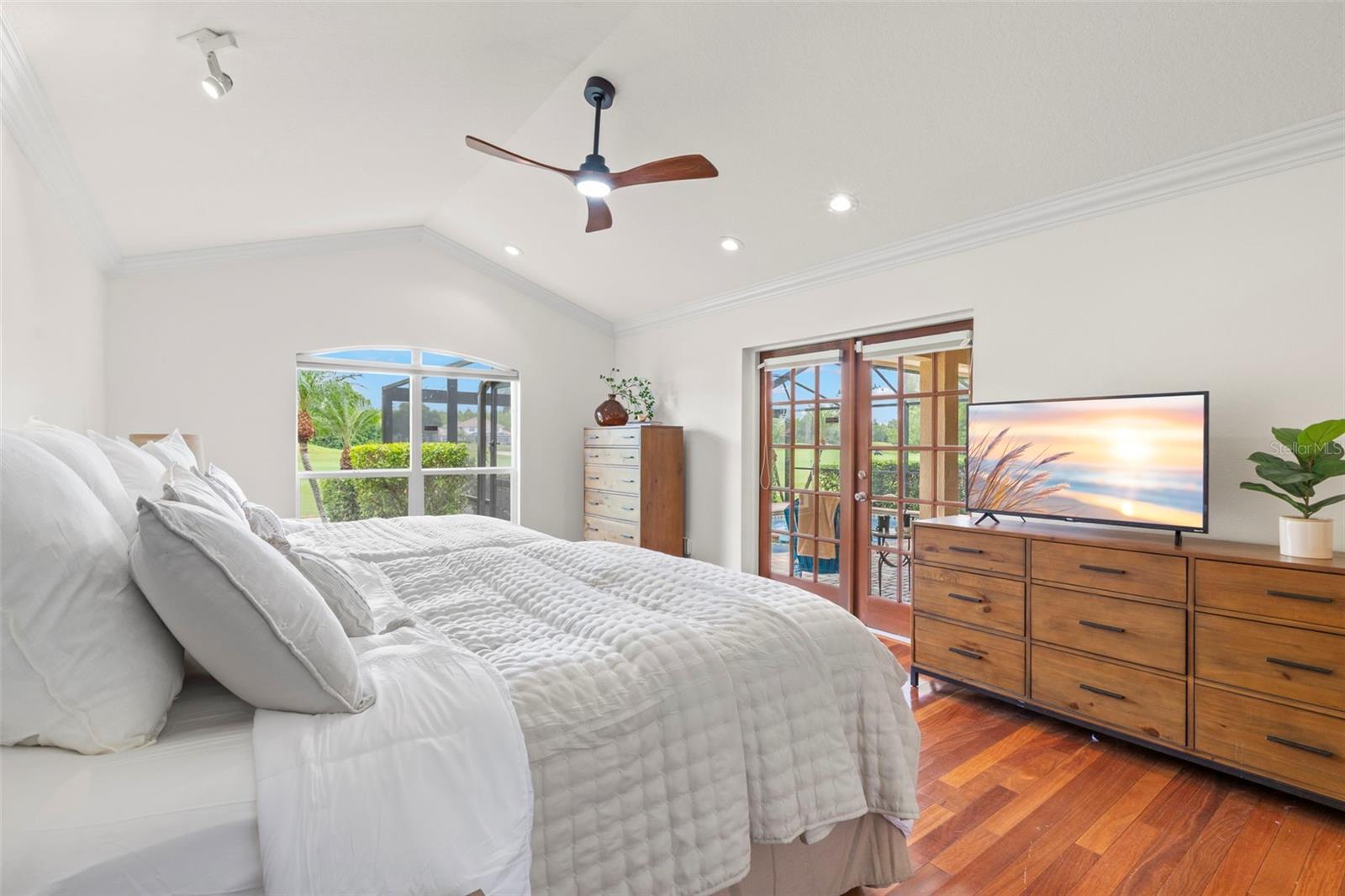 The Primary Bedroom is on the 1st floor, over looking the pool view and golf course.