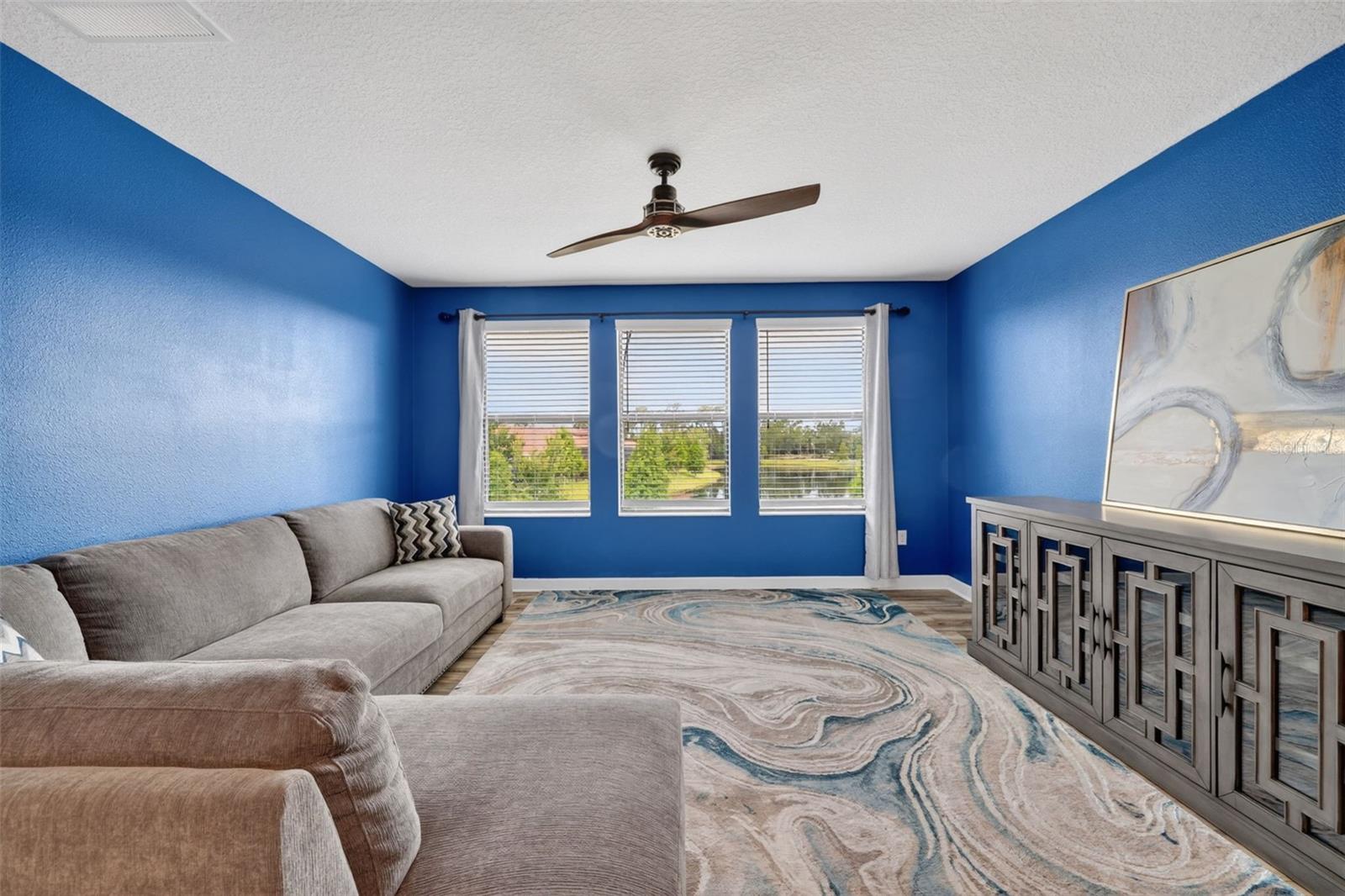 Loft Room with 3 Gorgeous Windows Overlooking the Pond and Peaceful Landscape. Imagine a Theatre, Media, Library, Game Room and more!