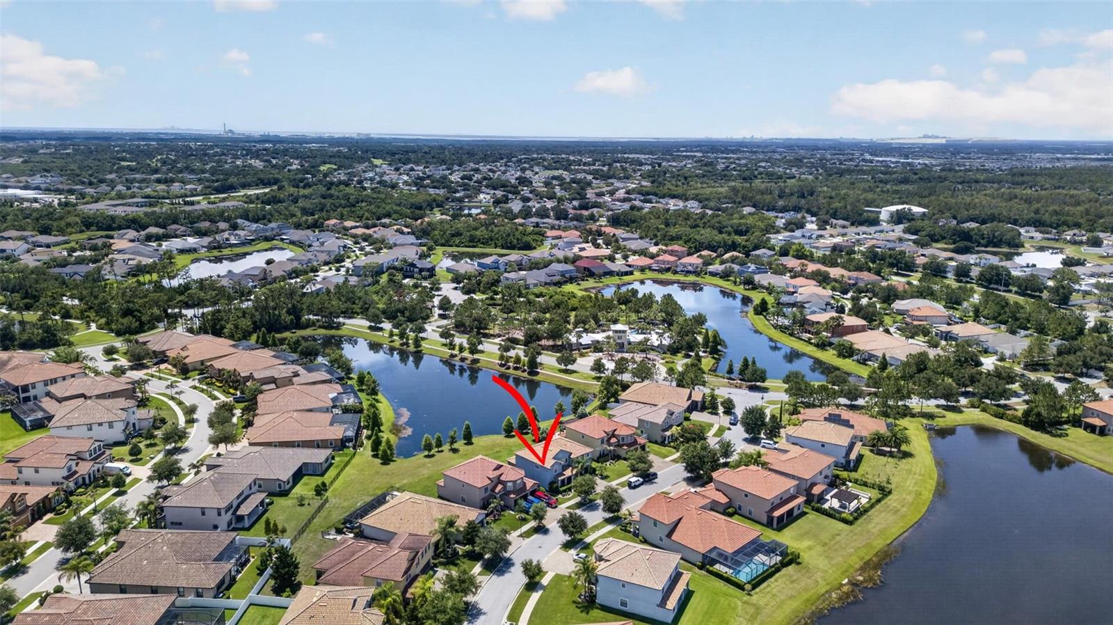 Picturesque Views of the Community from 2nd Floor! Aerial View of WCI Lennar Home on Premium Water Lot in Waterleaf Community! Located Near Entrance & Amenities!