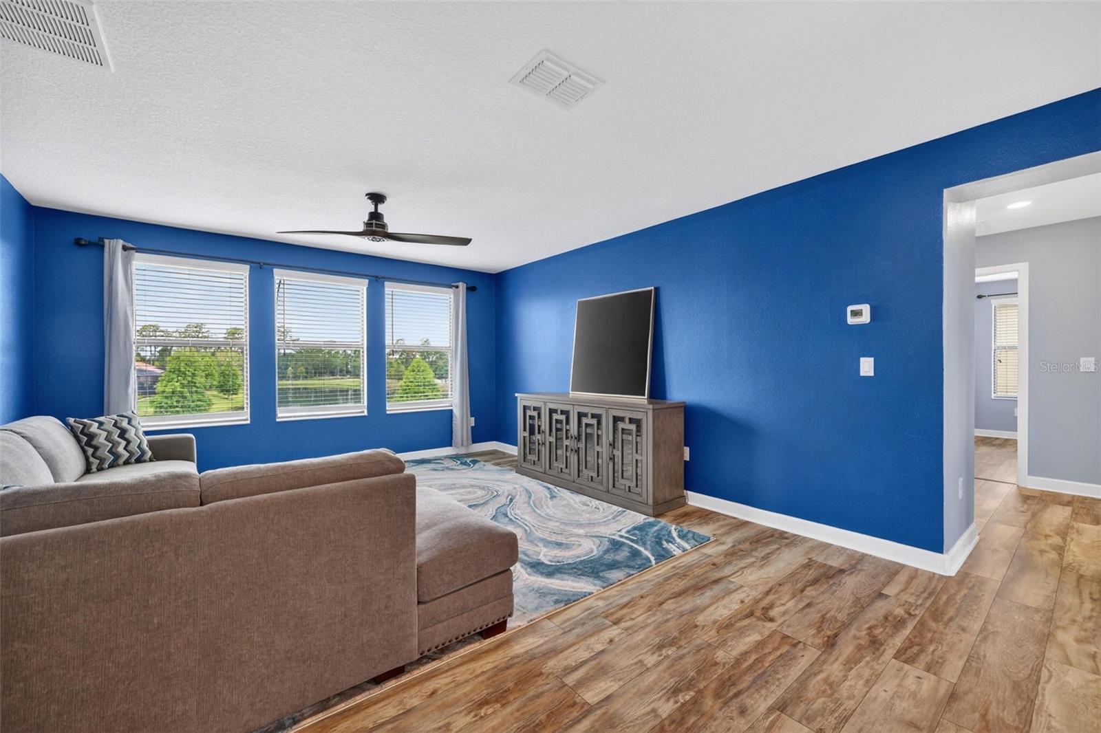 Loft Room with 3 Gorgeous Windows Overlooking the Pond and Peaceful Landscape. Imagine a Theatre, Media, Library, Game Room and more!