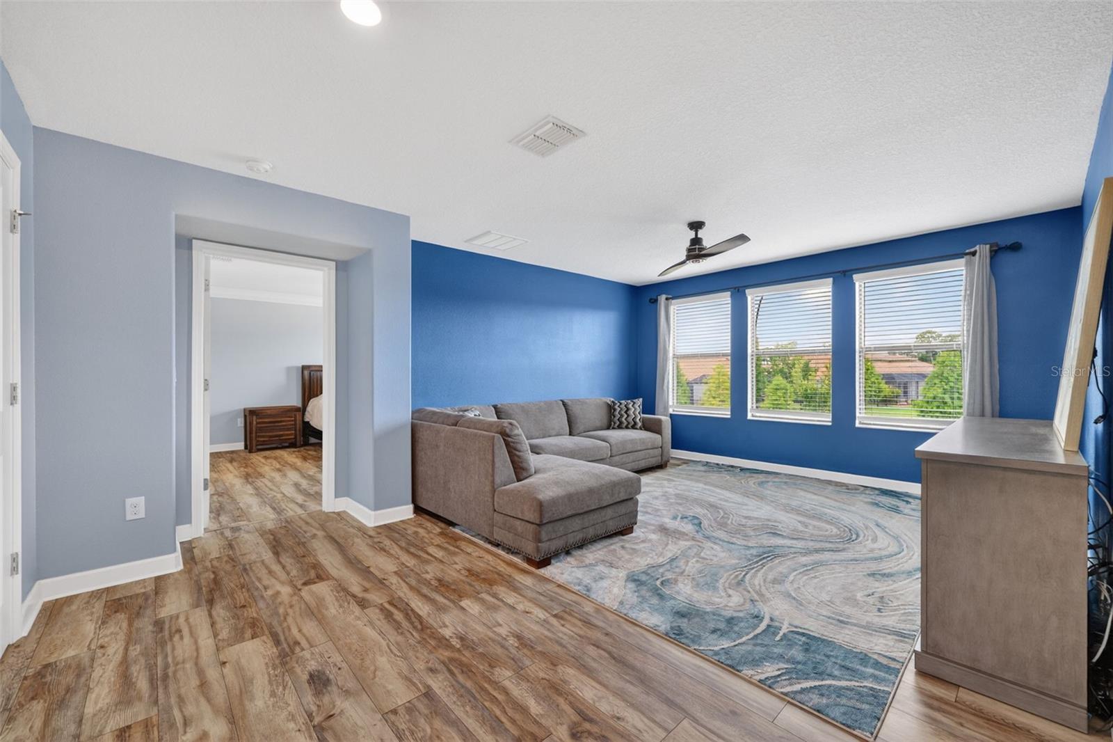 Loft Room with 3 Gorgeous Windows Overlooking the Pond and Peaceful Landscape. Imagine a Theatre, Media, Library, Game Room and more!