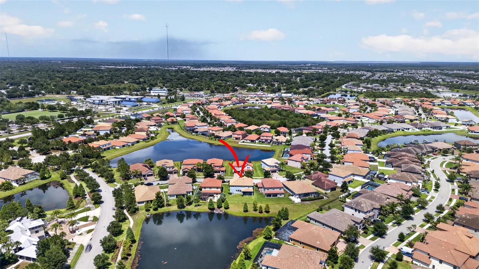 Picturesque Views of the Community from 2nd Floor! Aerial View of WCI Lennar Home on Premium Water Lot in Waterleaf Community! Located Near Entrance & Amenities!