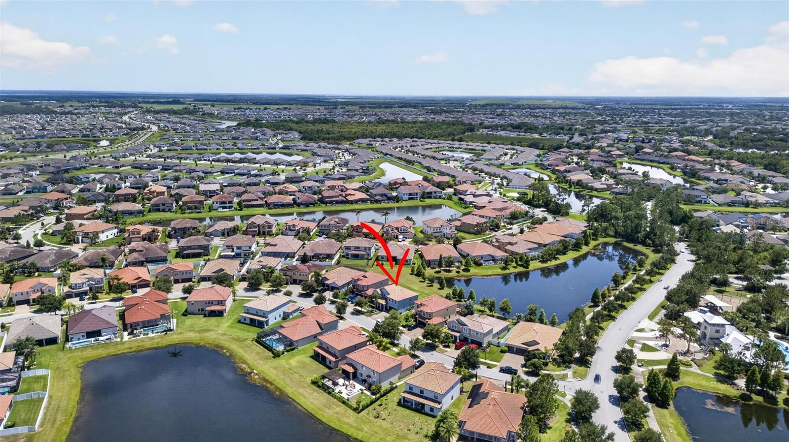 Picturesque Views of the Community from 2nd Floor! Aerial View of WCI Lennar Home on Premium Water Lot in Waterleaf Community! Located Near Entrance & Amenities!