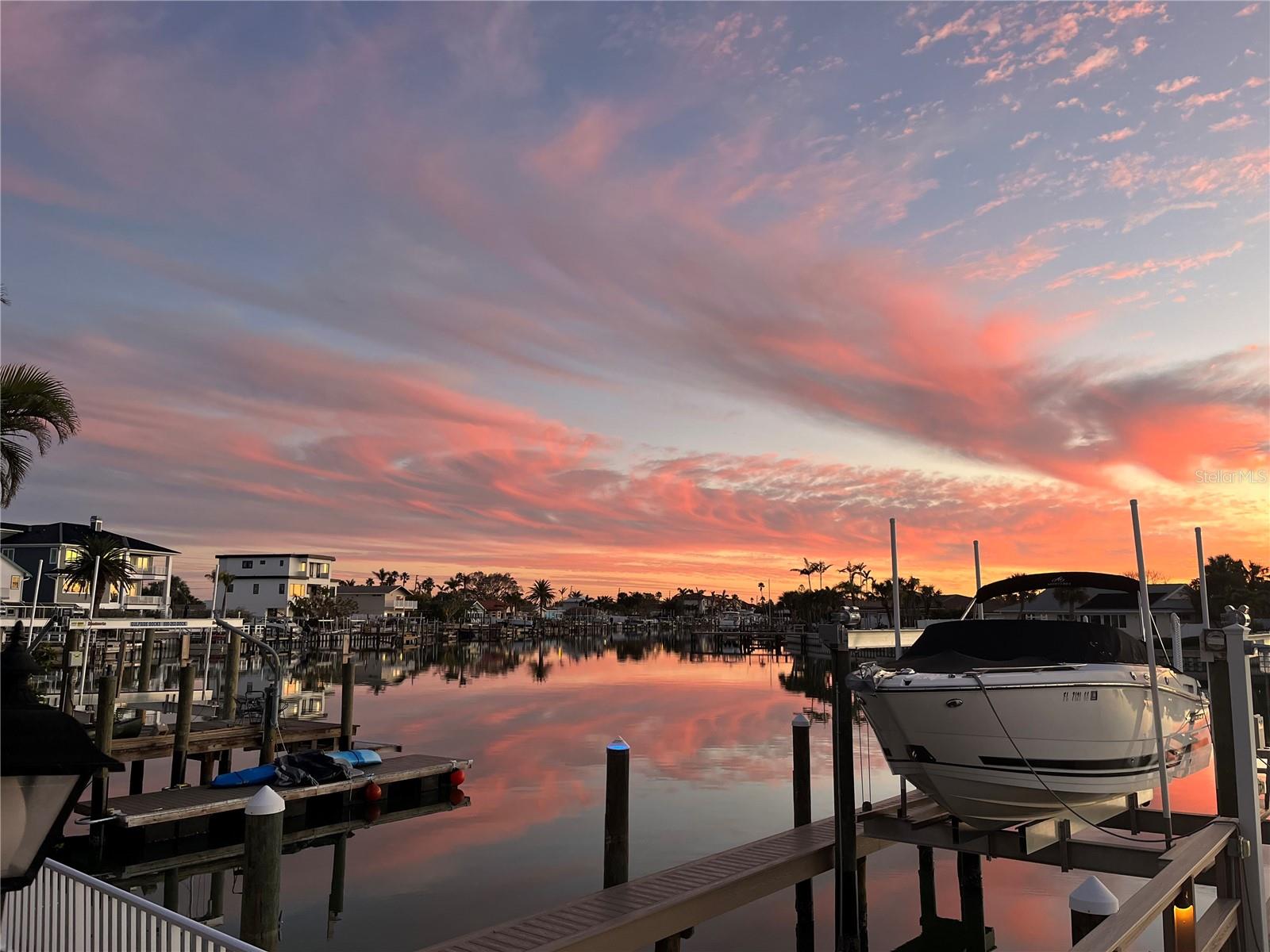 The sunset is beautifully reflected off the water