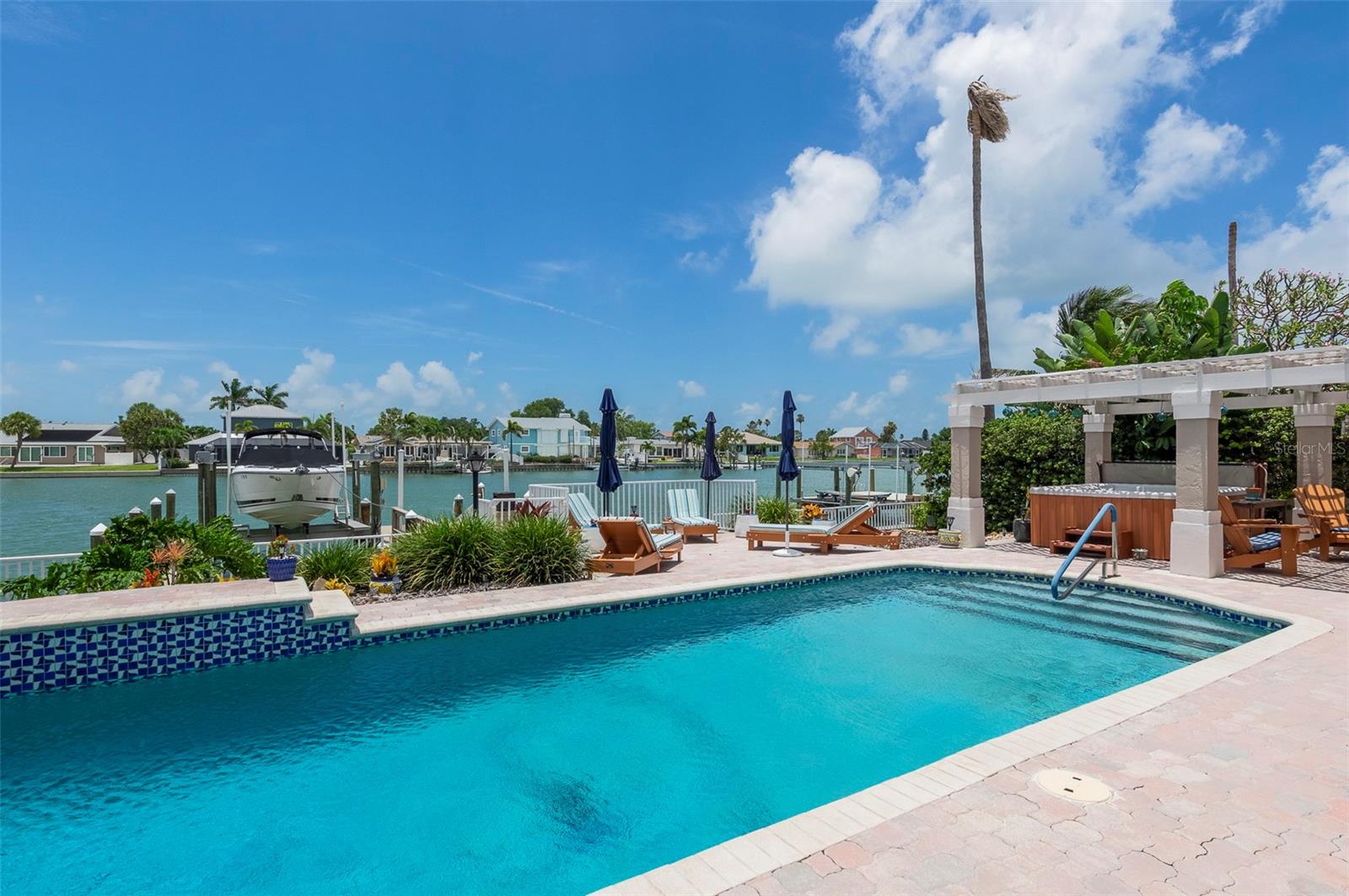 Saltwater pool overlooks the newer composite dock and the Bay