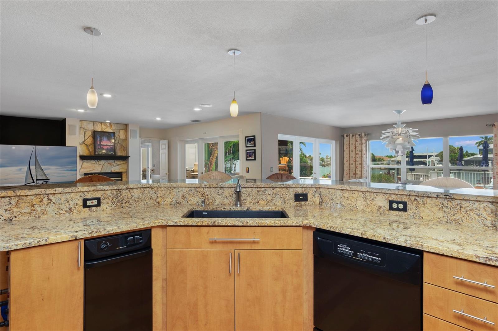 Spacious kitchen island opens to the main living area