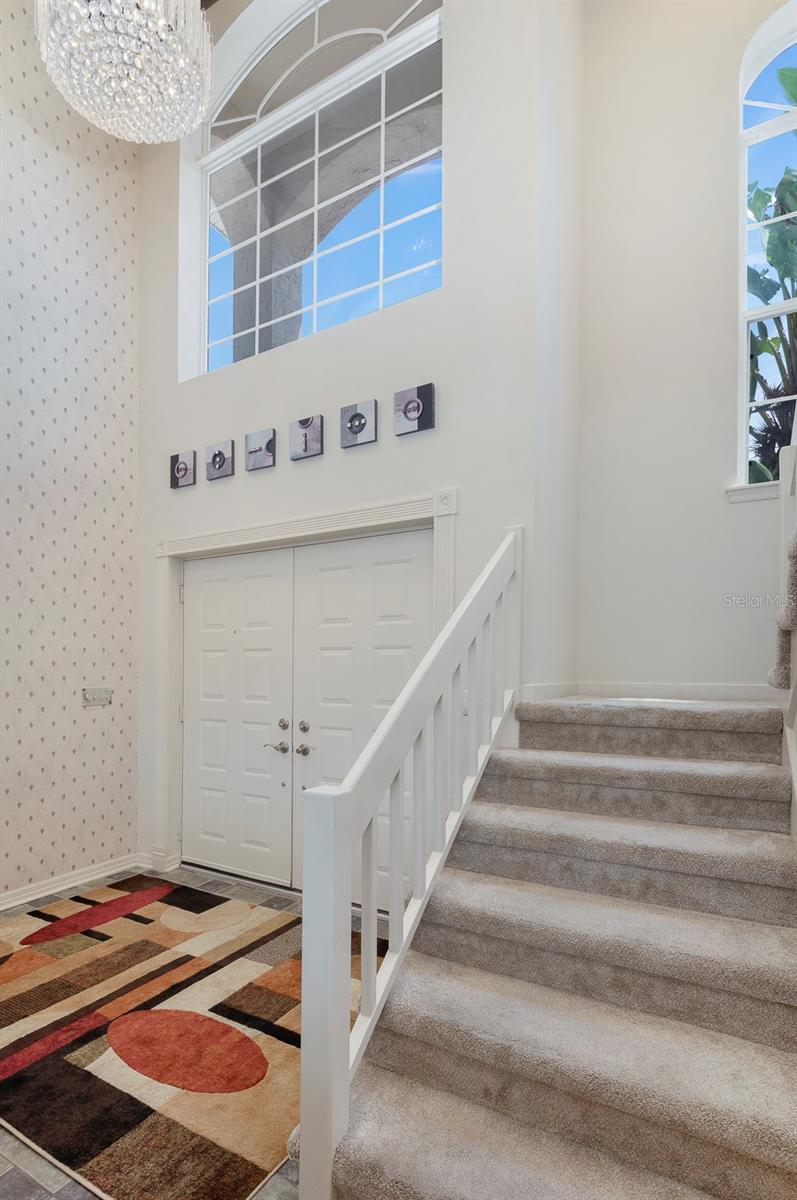 2-story front entryway with stairs to 2nd level master suite