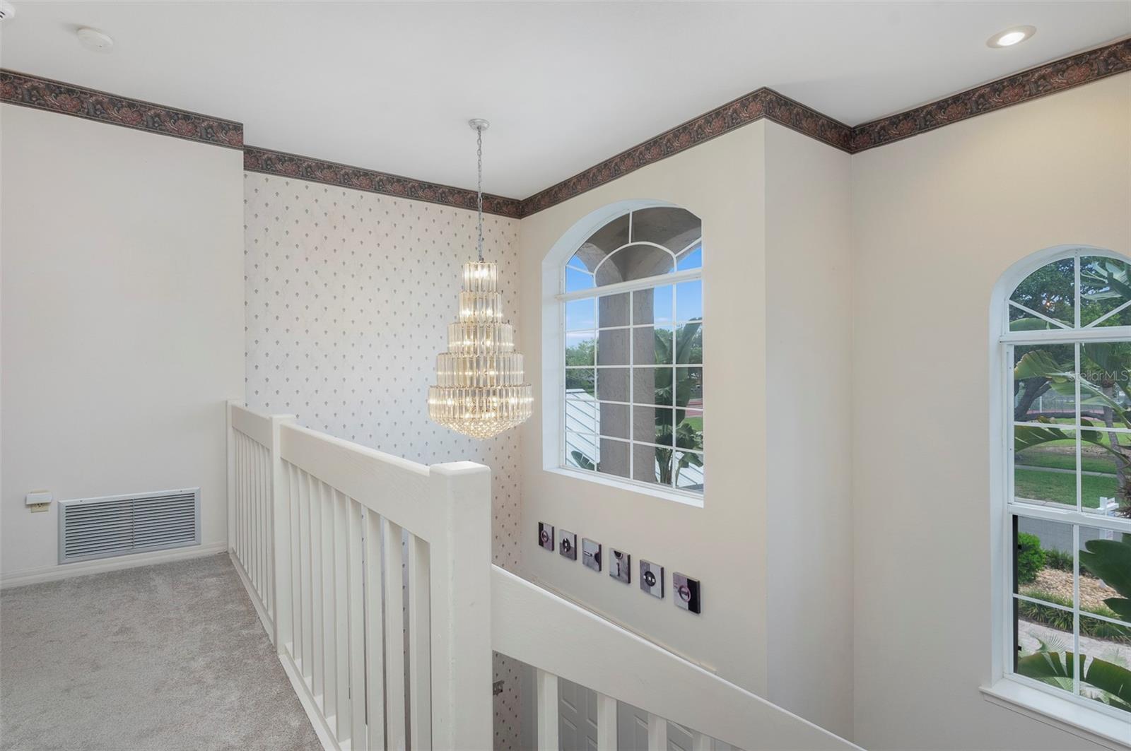 2nd level with stunning architectural windows