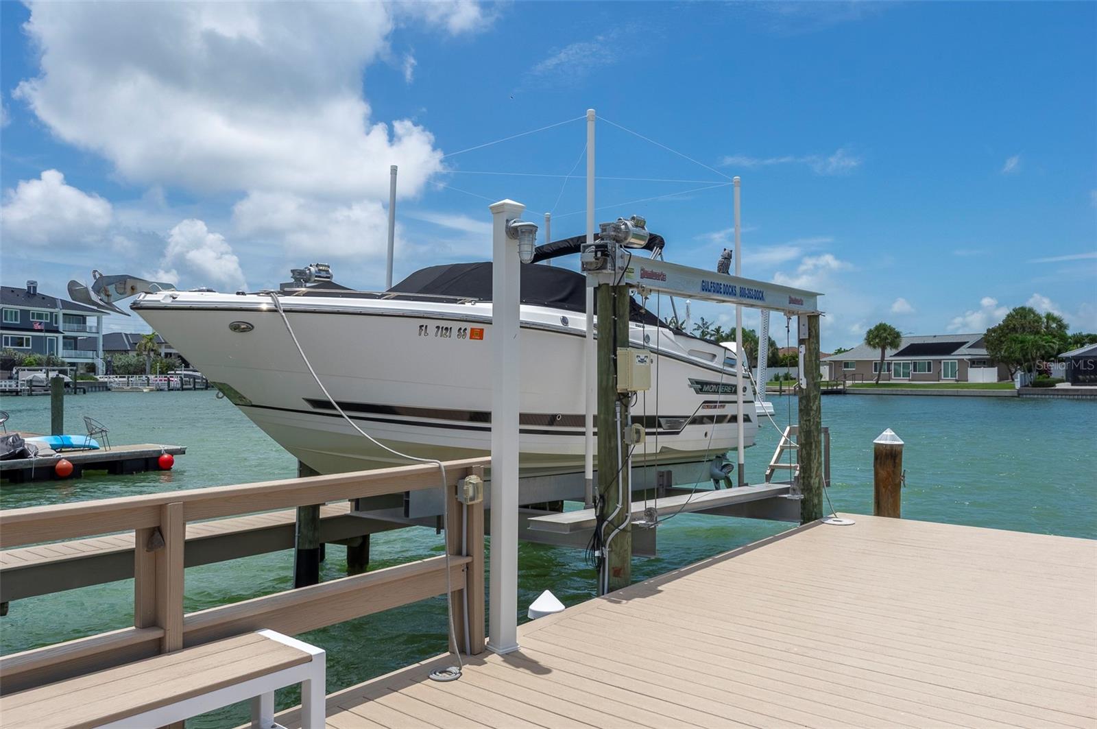 Composite dock, 16k lb life, wrapped pilings, catwalk, electric & water supply, shower, and dockbox