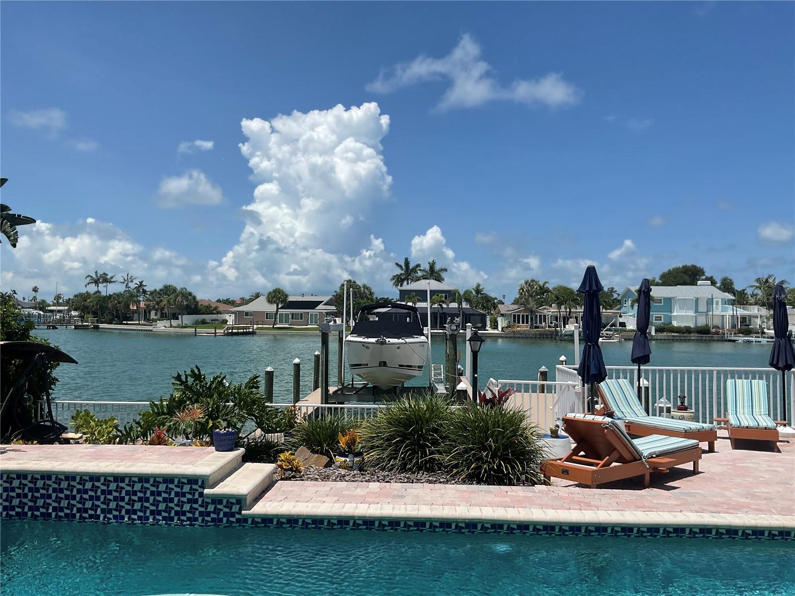 Heated Saltwater Pool overlooks the Dock and the Bay