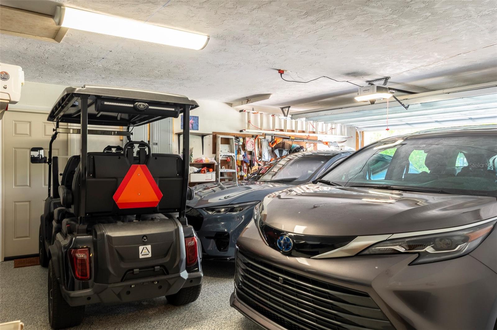 2-car garage has room for a golf cart, too