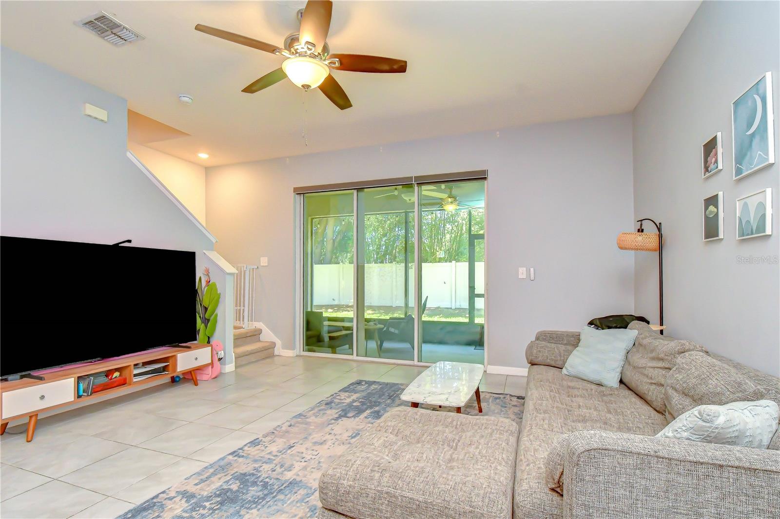 Comfortable and bright gathering space perfect for relaxing or entertaining guests.