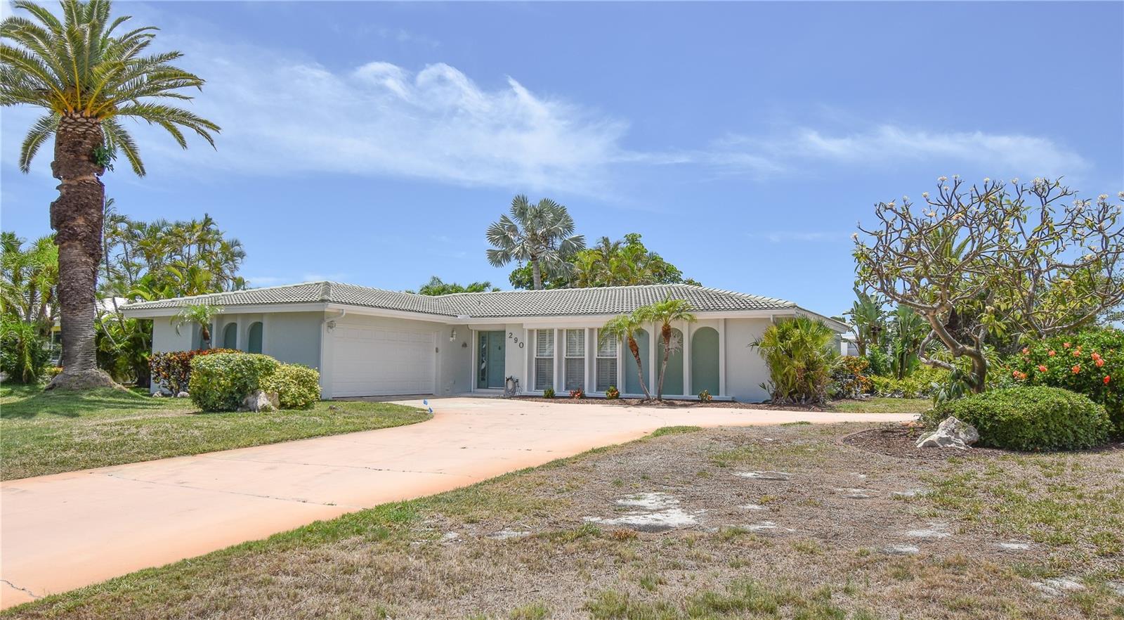 Additional view of front yard and house. Lg. circular driveway