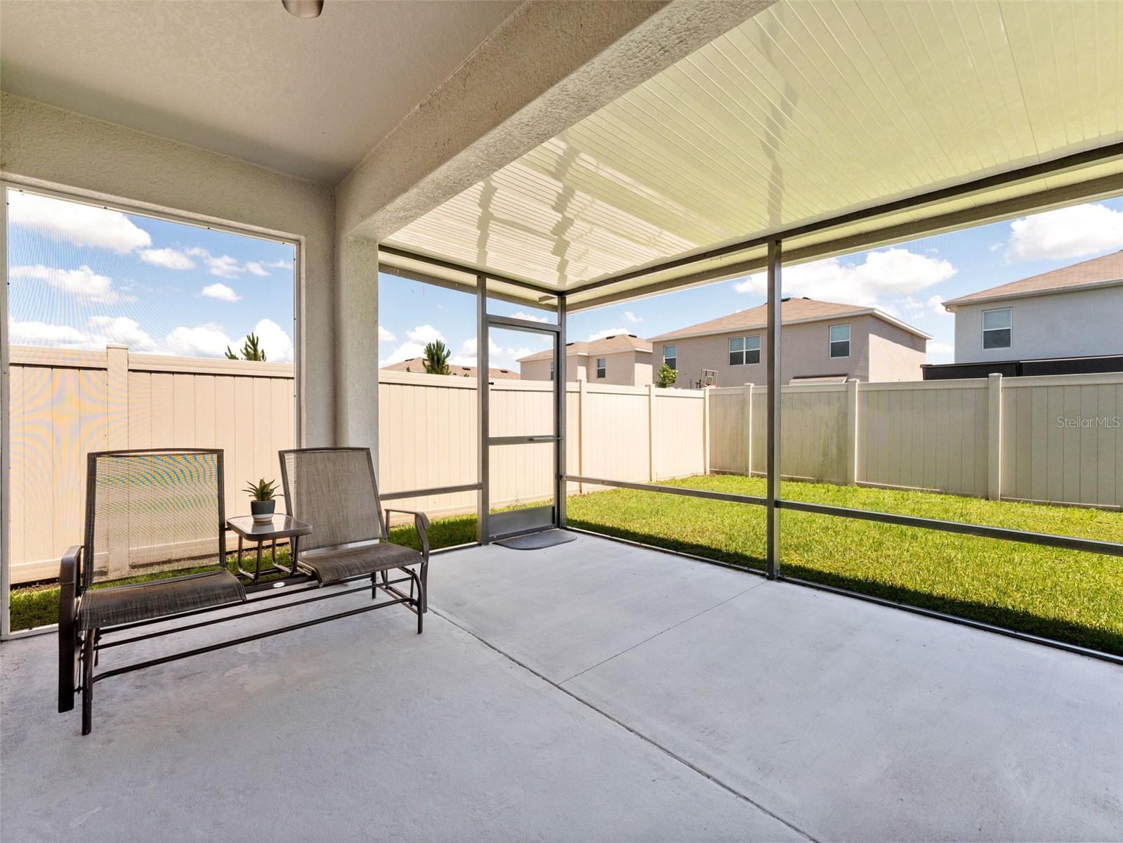 Extended covered, screened in patio