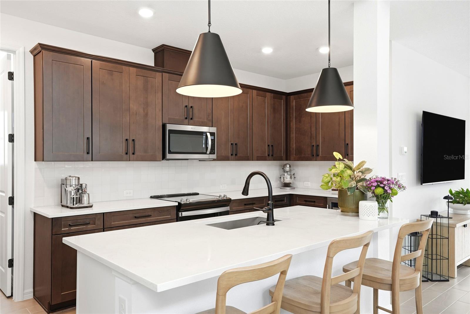 Elevated Kitchen Cabinets, Stone Counters