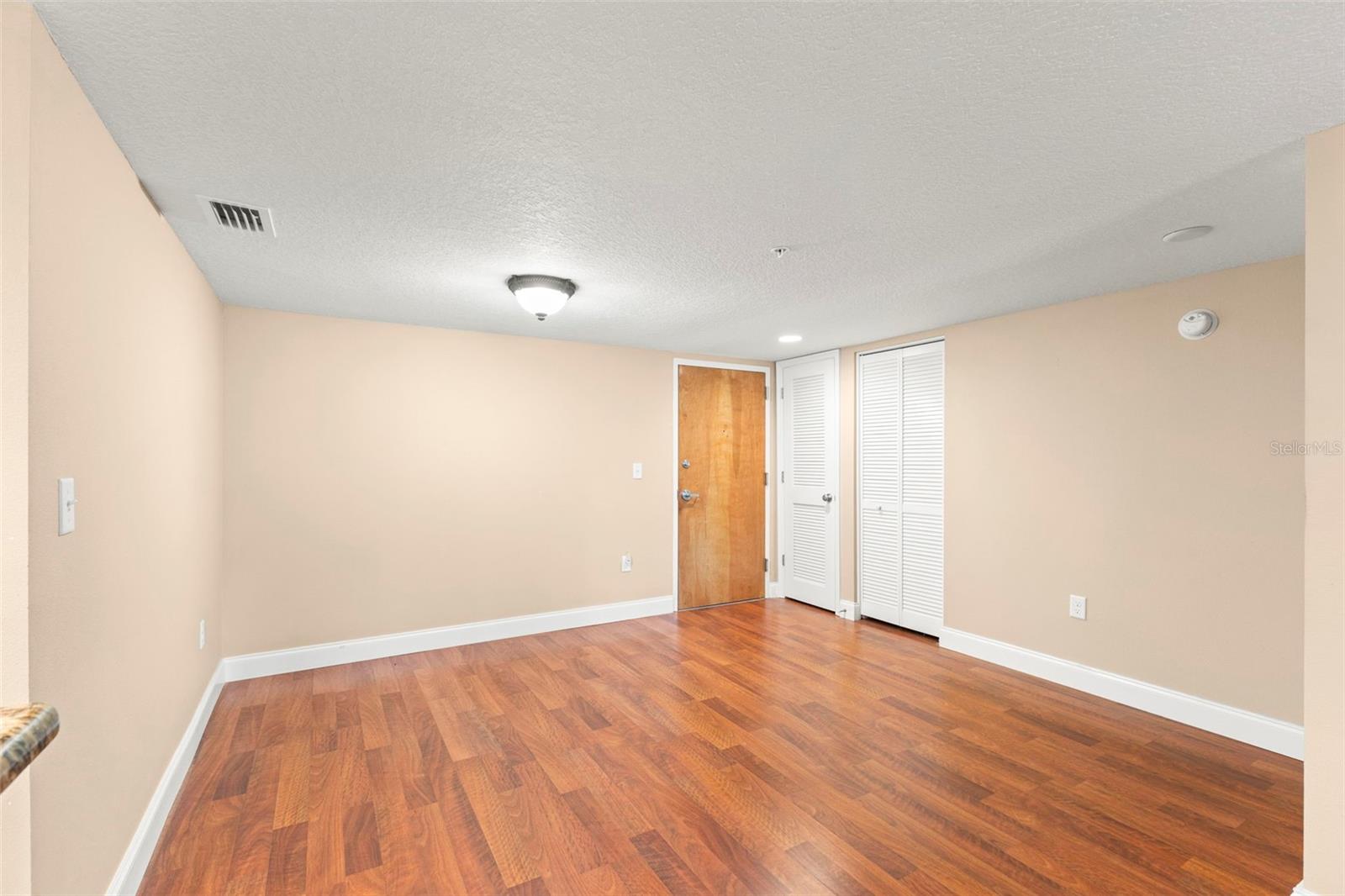 A spacious dining area just off the kitchen provides the perfect setting for everyday meals, holiday gatherings, and entertaining.