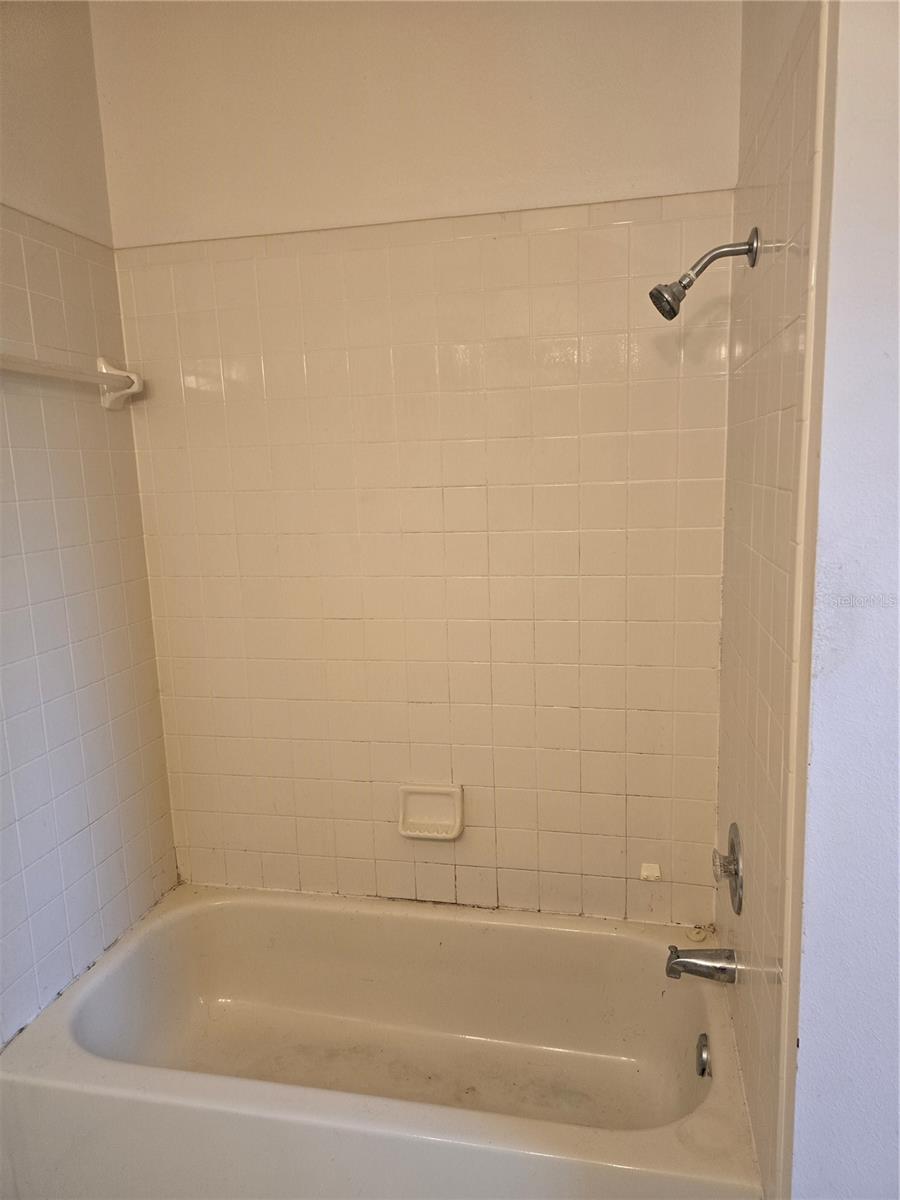 Primary bathroom with tub and sink