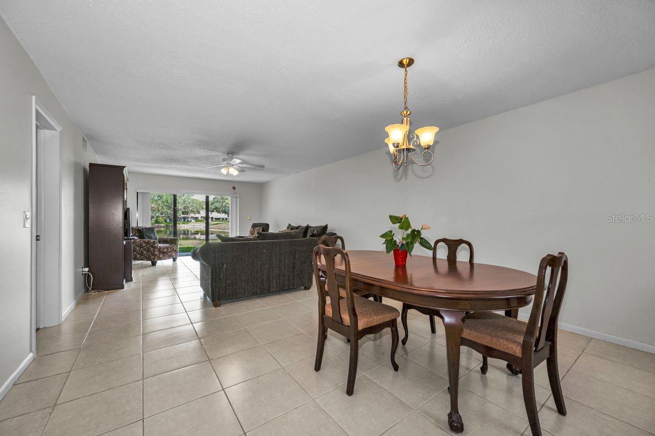 living room and dining w/pond view