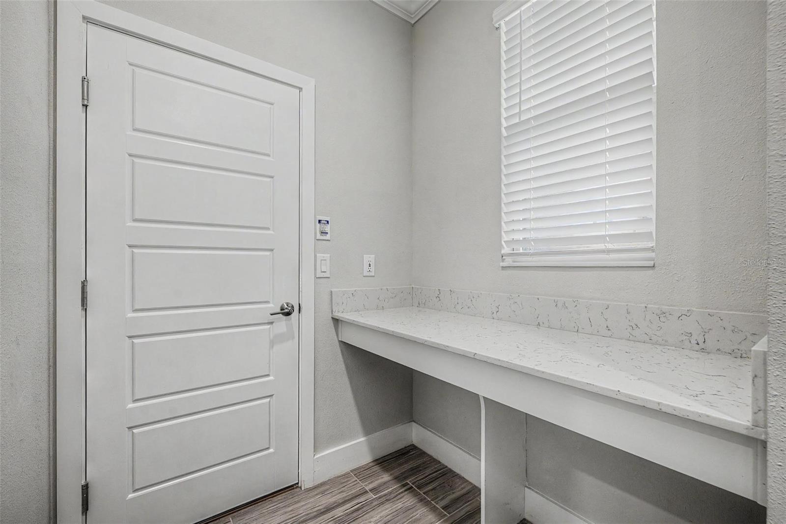 The home has a thoughtful "drop" area
