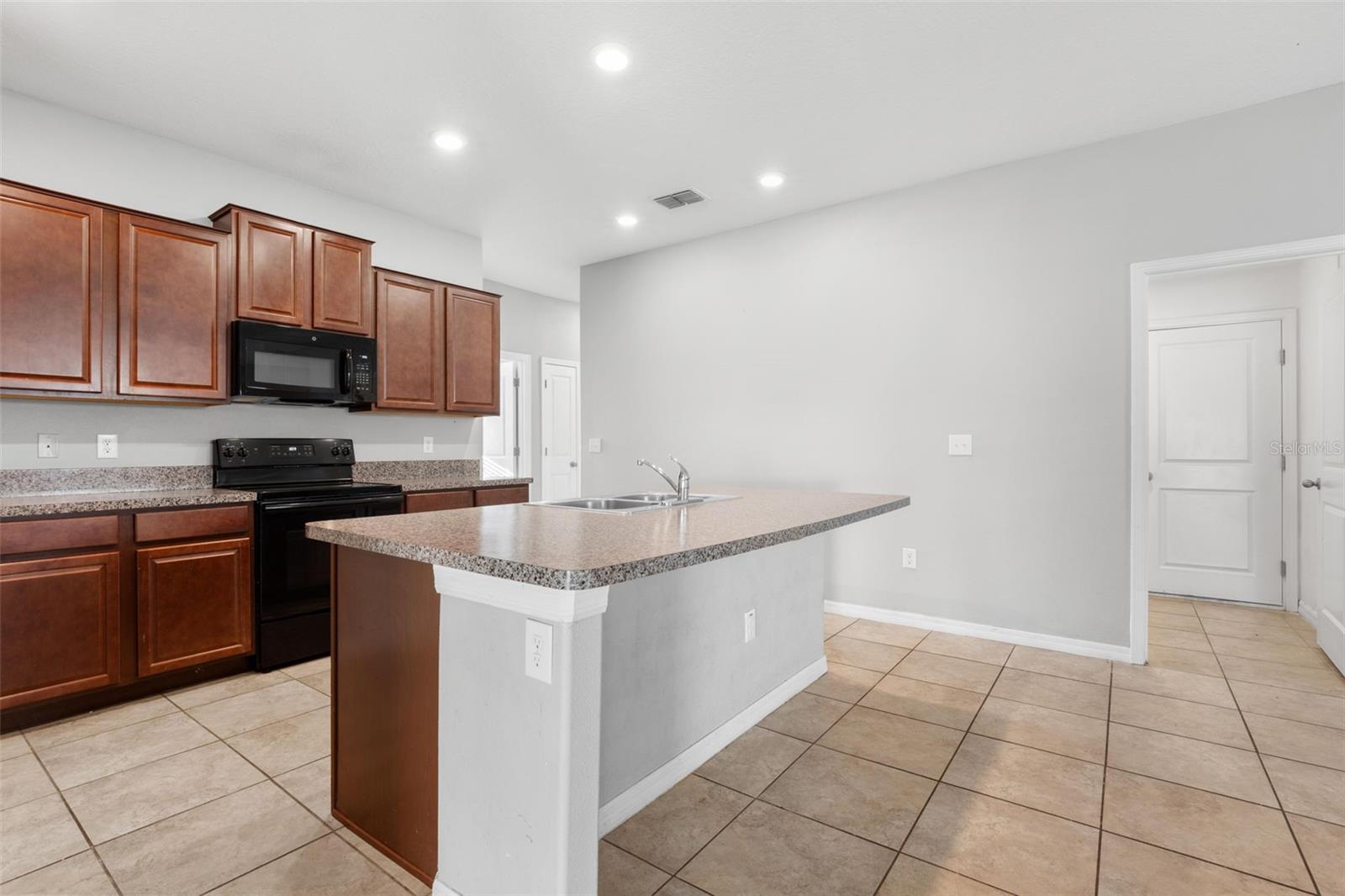 Enjoy a spacious, fully fenced backyard with ample room for outdoor activities, future landscaping, or a custom patio expansion.