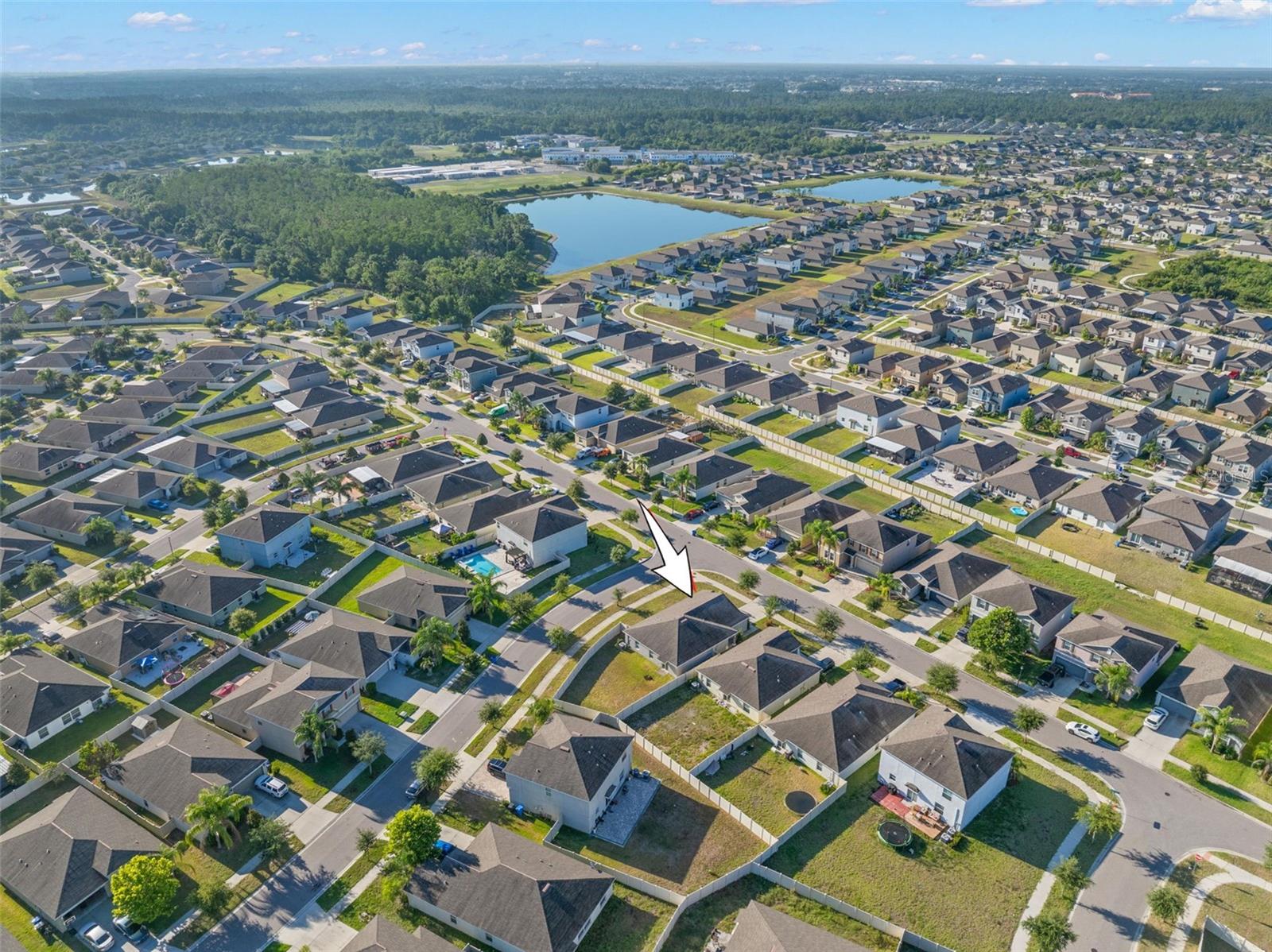 A desirable corner-lot setting with sidewalks, decorative street lighting, and a welcoming neighborhood streetscape.