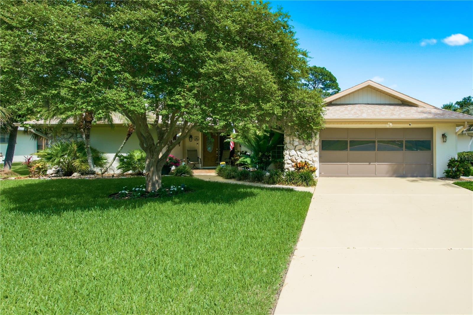 Fully storm protected home with hurricane proof windows, doors and garage door!