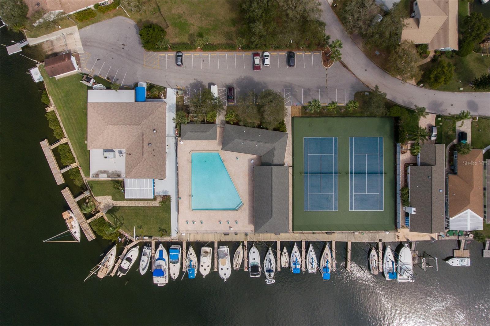 Featuring the community boat ramp, yacht club, heated pool, and tennis courts and boat slips available to be rented.