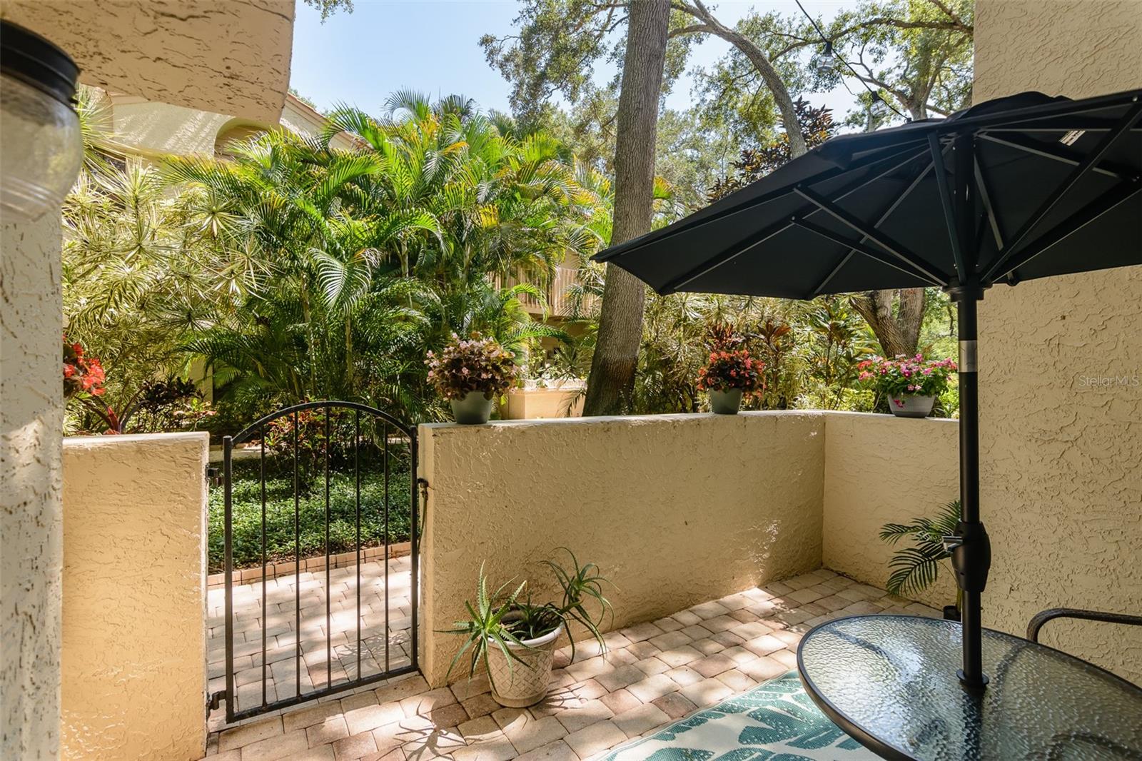 Lush grounds to admire from your front patio.