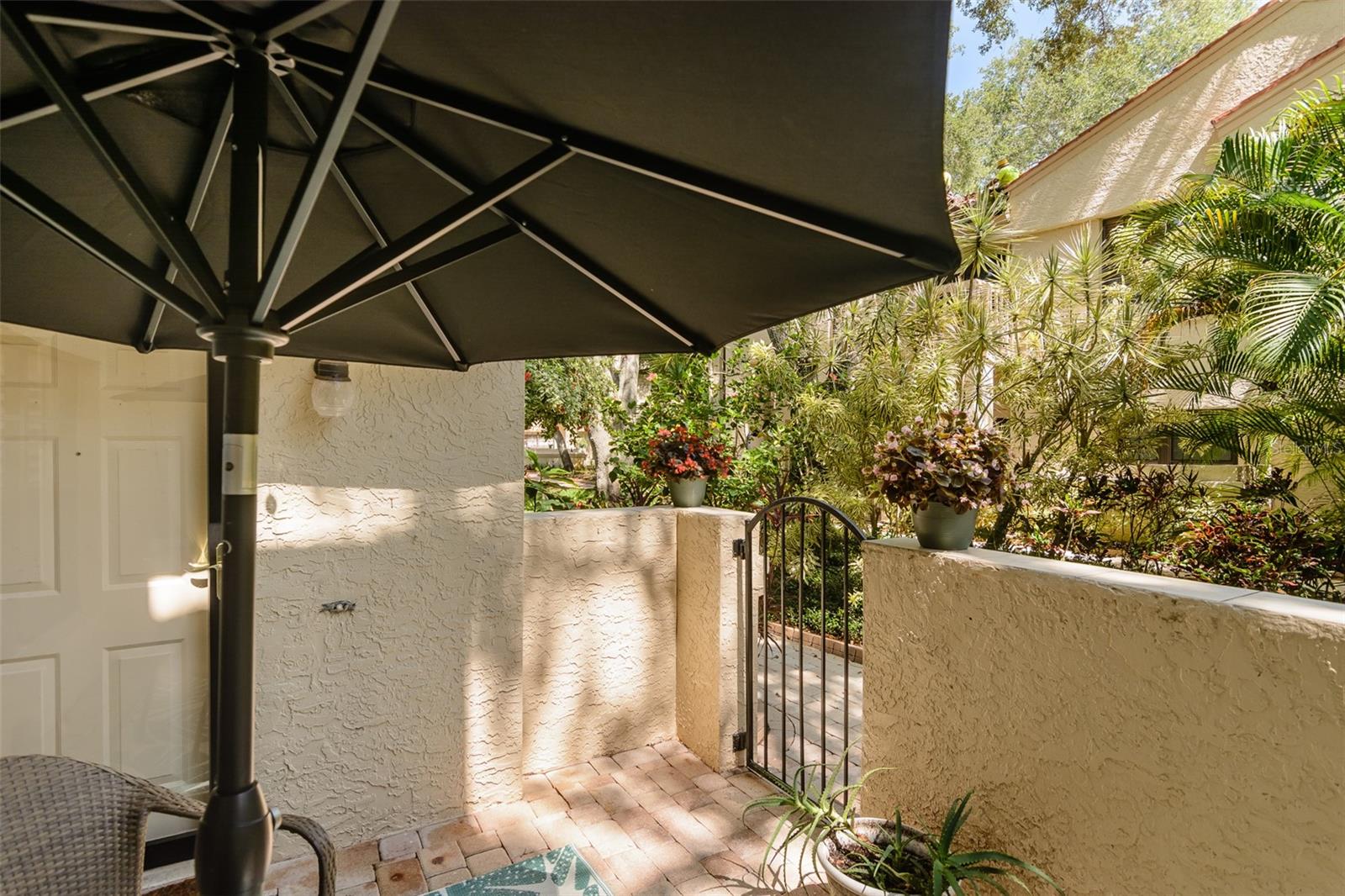 Charming gated entry to your new home.