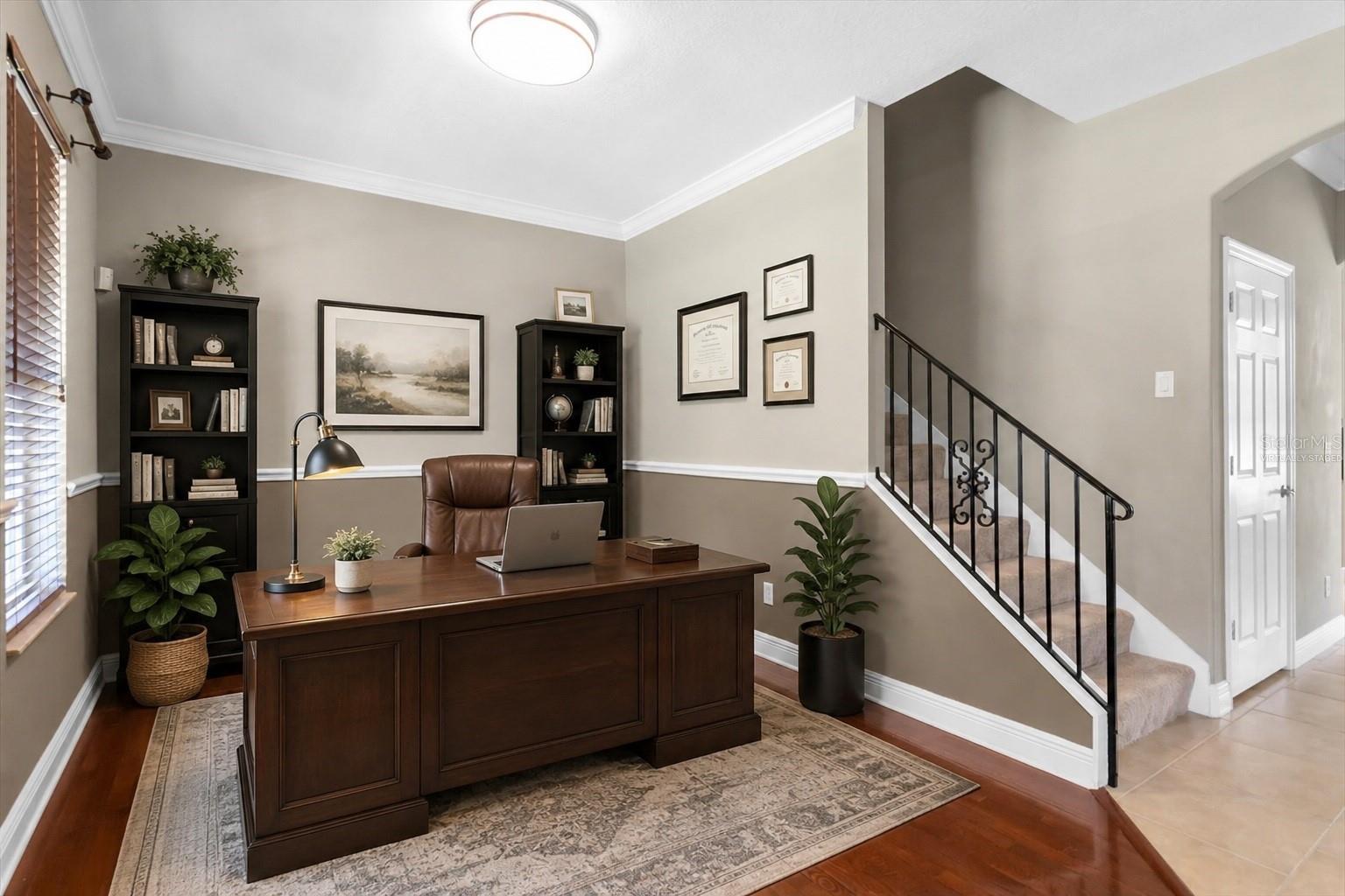 virtually staged. Dining room or office space