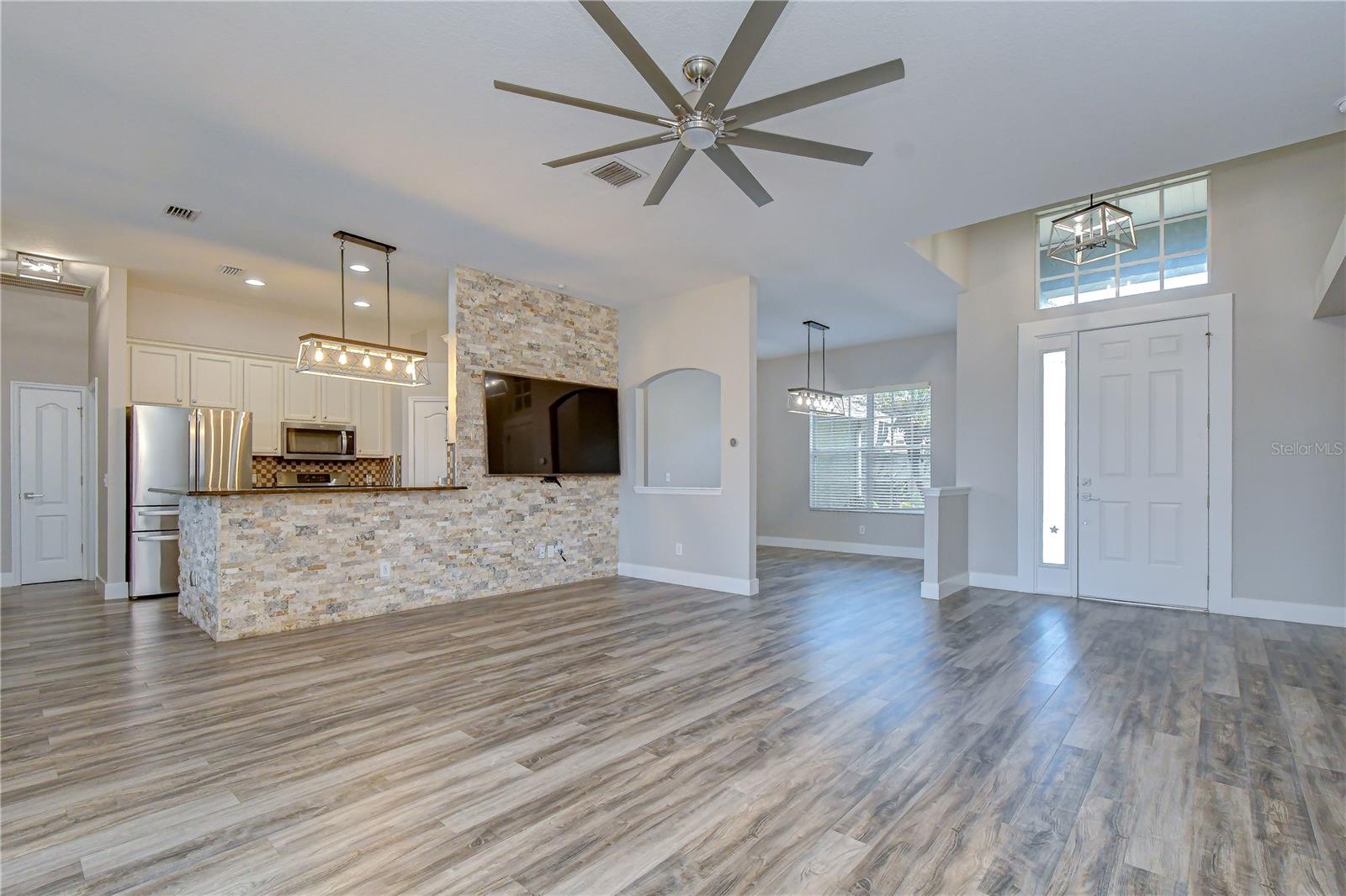 Comfortable gathering space overlooking the pool area.