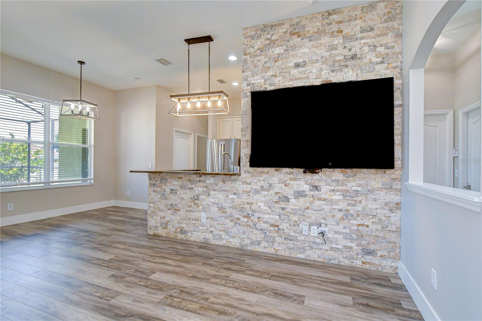 Bright casual dining area filled with natural light.