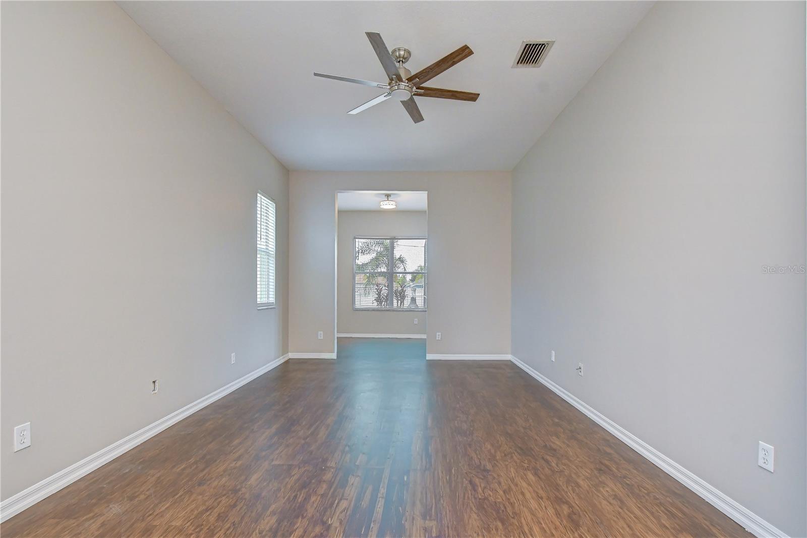Spacious owner’s retreat with peaceful backyard views.