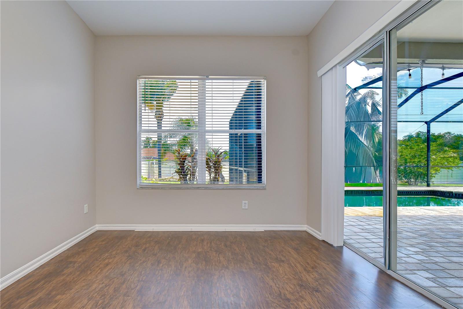 Open-concept layout with sliding glass doors leading to the lanai.