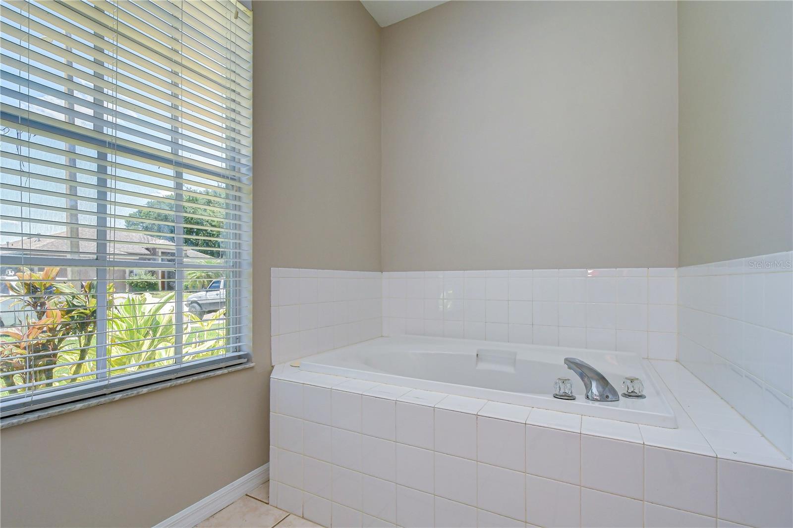 Spacious owner’s bathroom retreat.