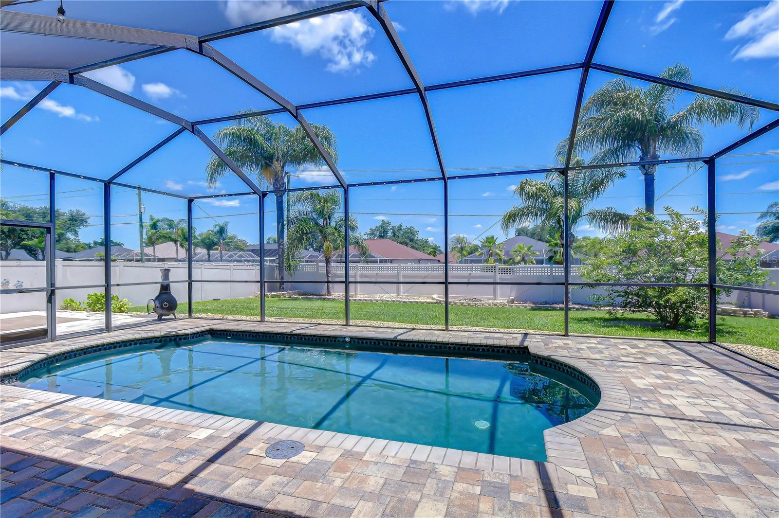 Relaxing shaded space overlooking the pool.