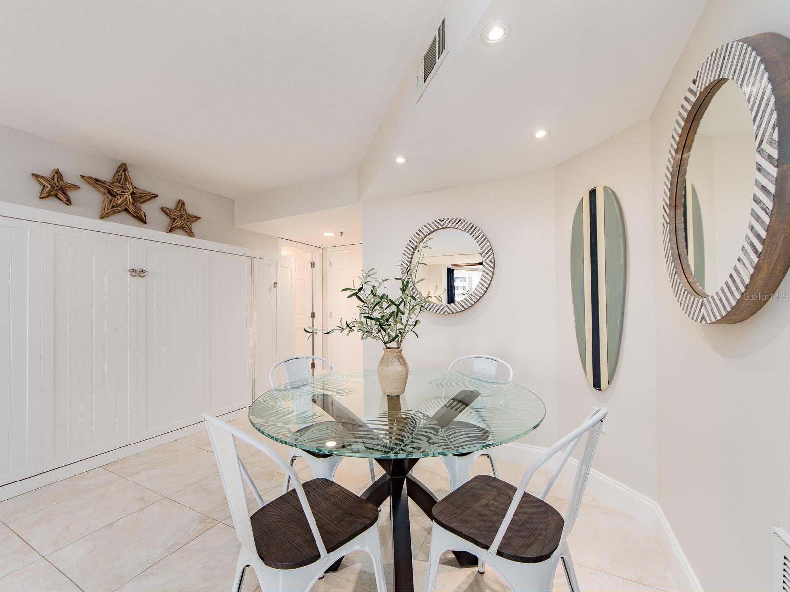 Dining and murphy bed for guests