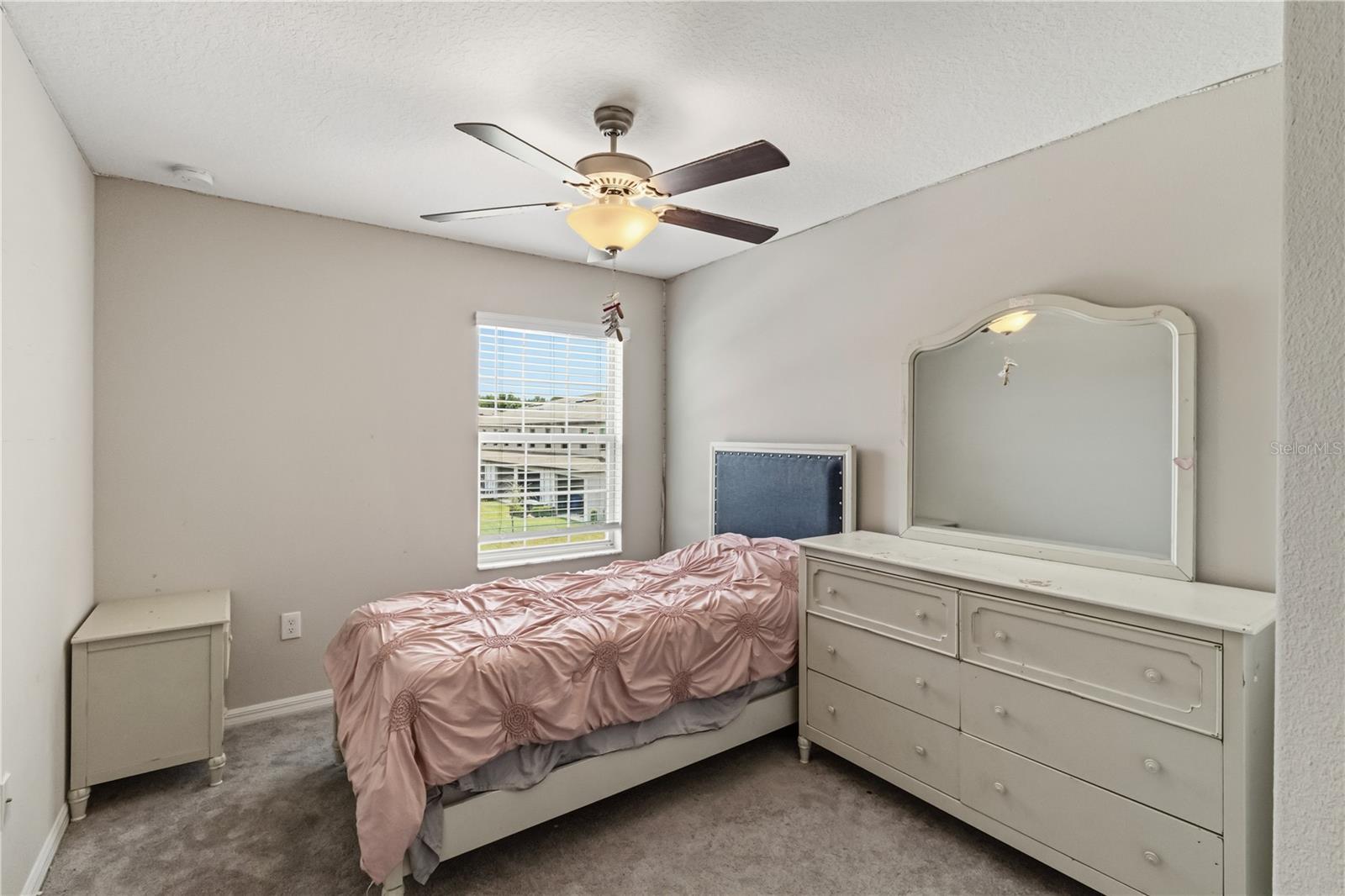 Secondary bedroom with natural light