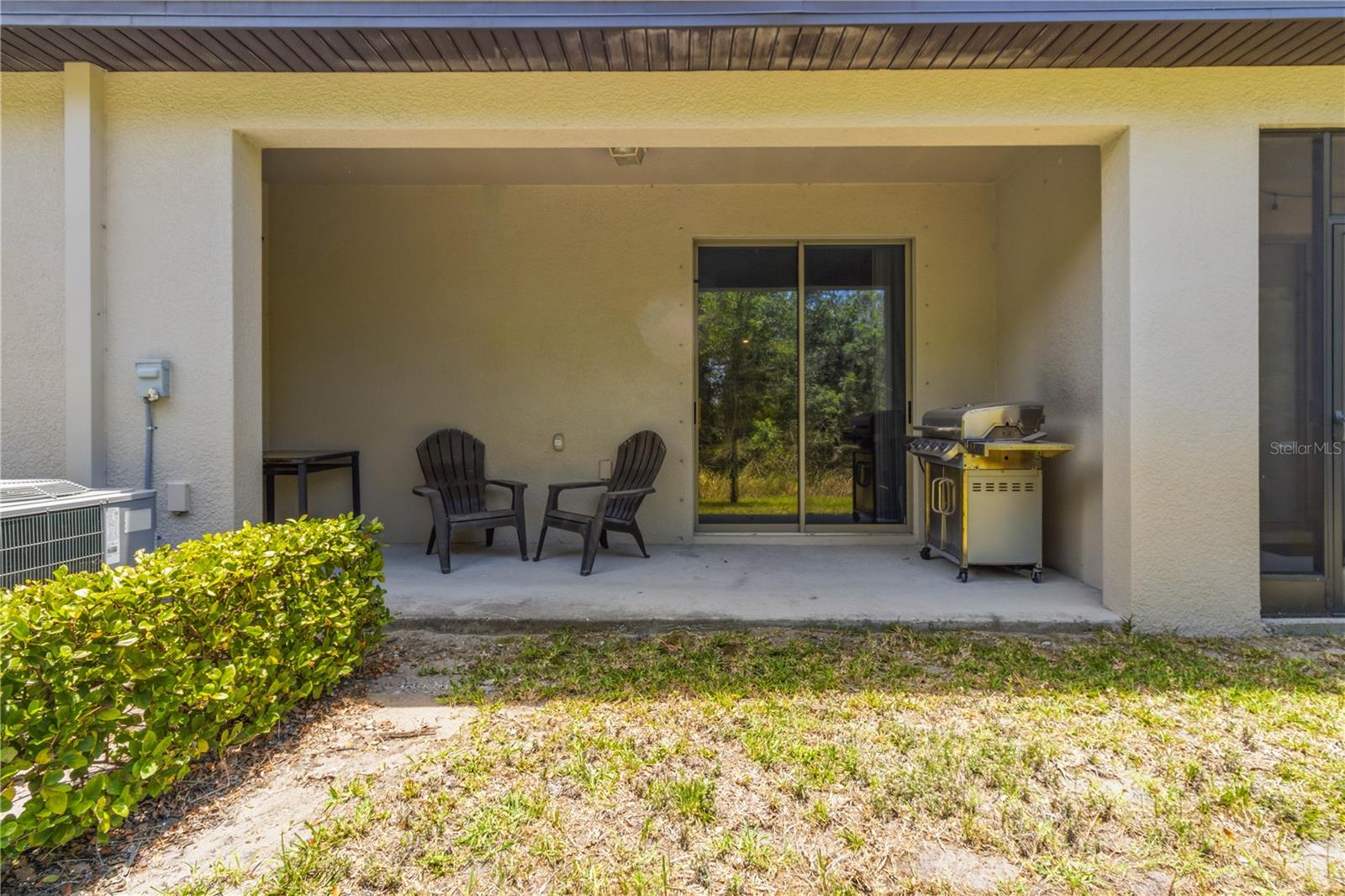 Patio overlooking open green space