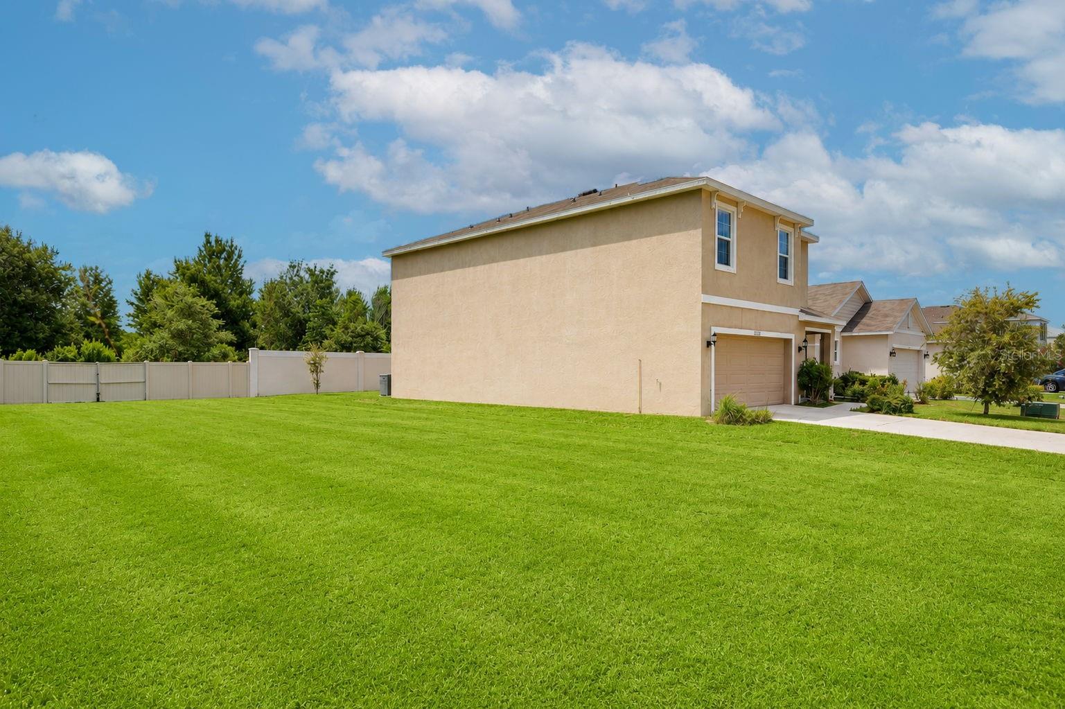 Large grassy common area next to home- lots of space!